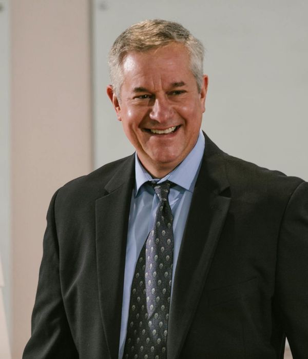 Man executive consultant in business attire with confident leadership presence