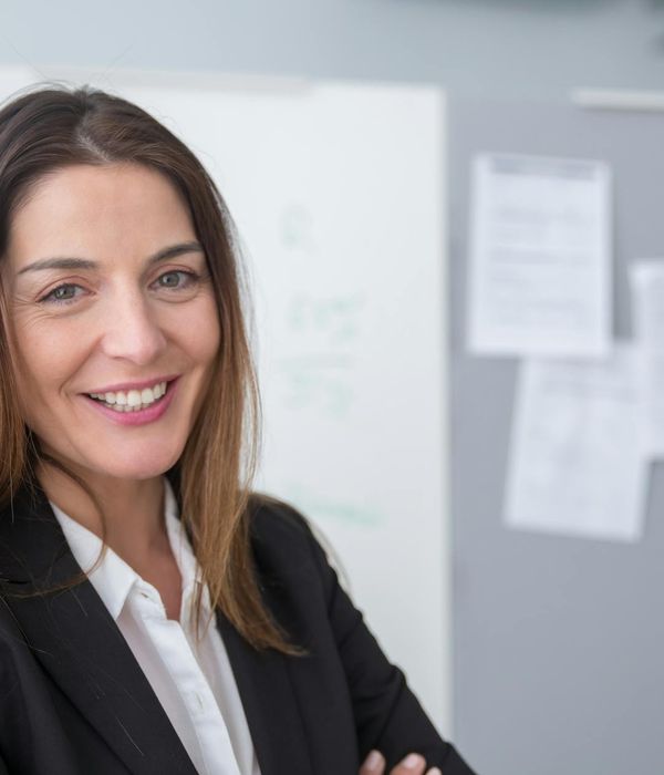 Woman executive consultant leading business presentation with strategic vision